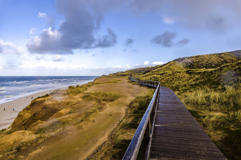 wooden-road-red-cliff-near-beach-sylt-germany-2