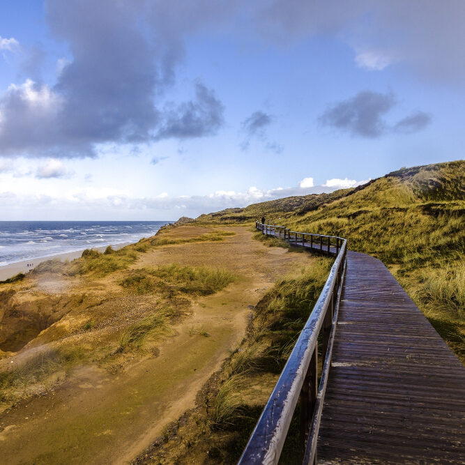 wooden-road-red-cliff-near-beach-sylt-germany-2